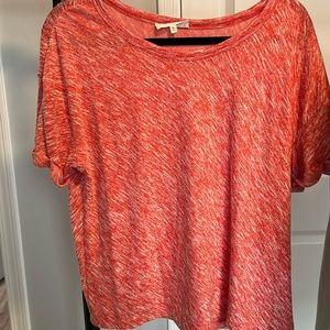 Lou and grey orange shirt